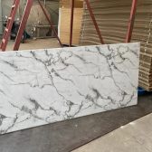 UK-BC003 marble-look wide PVC wall panel in a supplier catalog setting