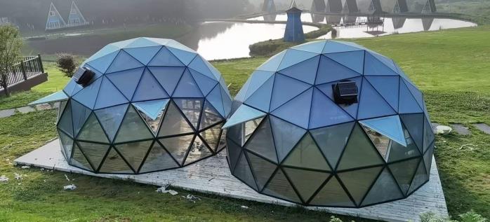 图片包含 草, 圆顶, 建筑, 户外

AI 生成的内容可能不正确。