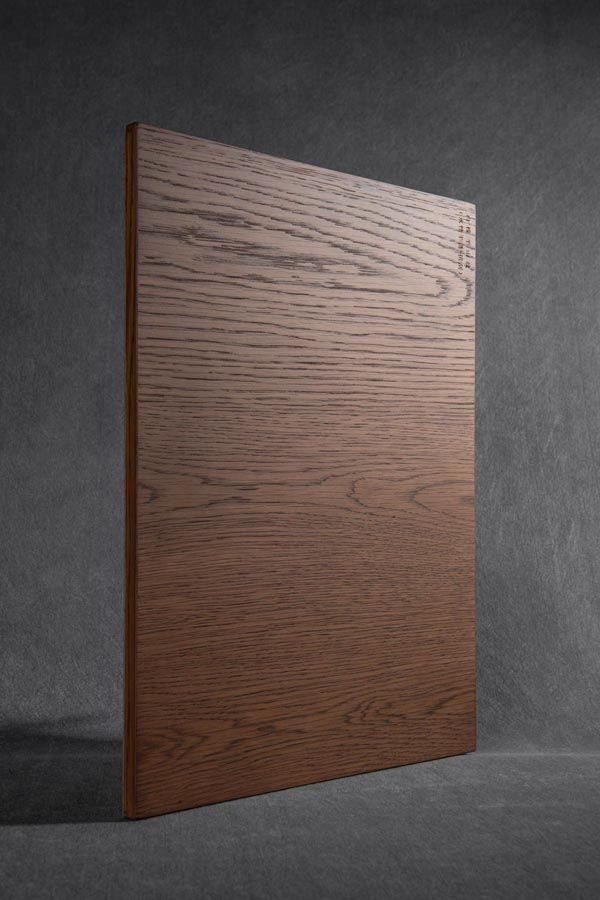 Brown oak veneer sample in crown grain