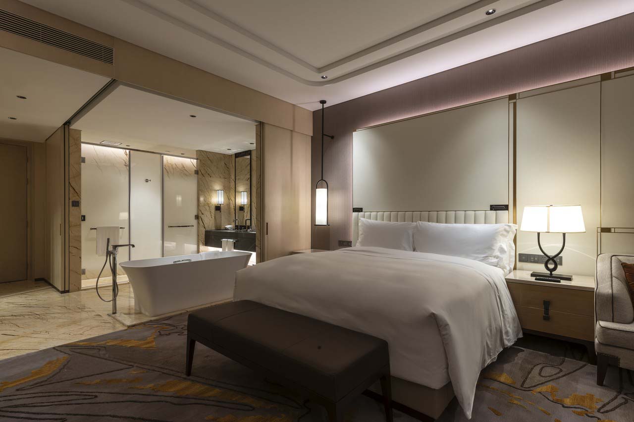 Hotel room featuring tailored furniture and renovation.