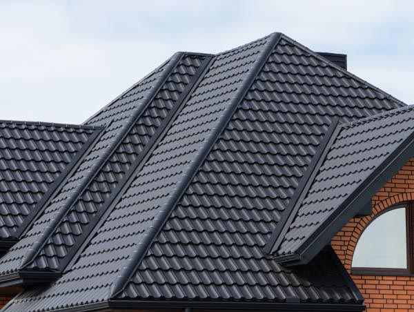 Sand coated steel roofing system