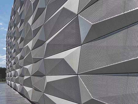 Perforated aluminum cladding for building exterior