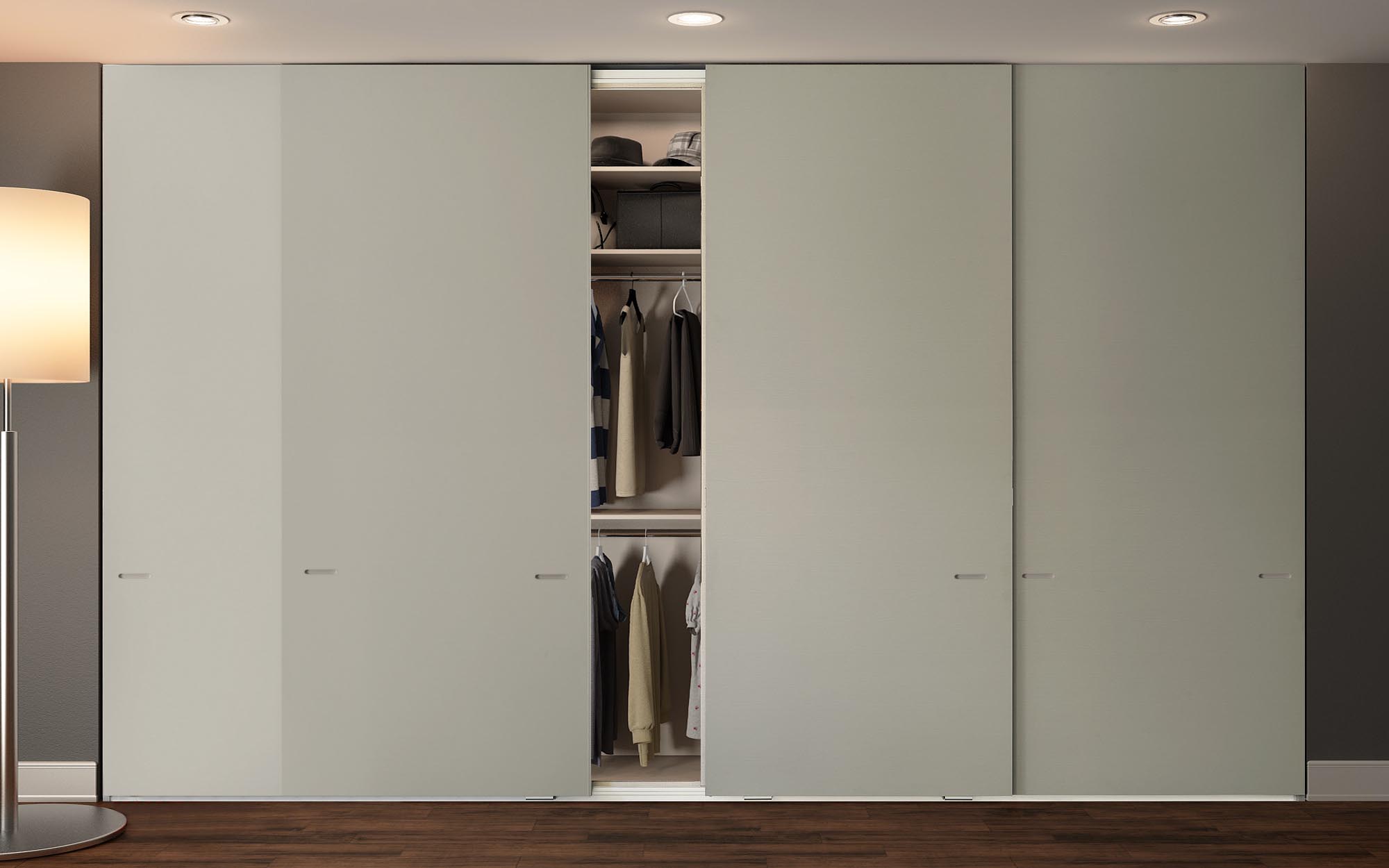 Light sage green lacquered frameless sliding door closet with four sliding panels