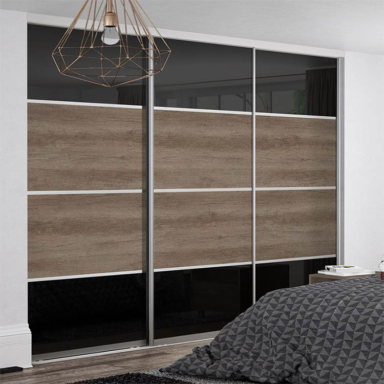 Aluminum-framed white melamine sliding door closet with three sliding door panels