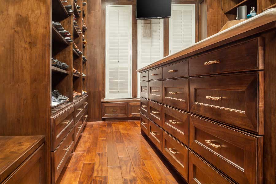 Stained wood walk-in closet