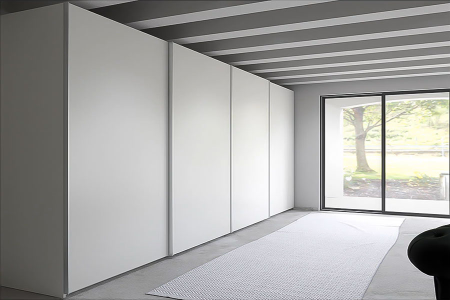 Concealed sliding track closets with white lacquer
