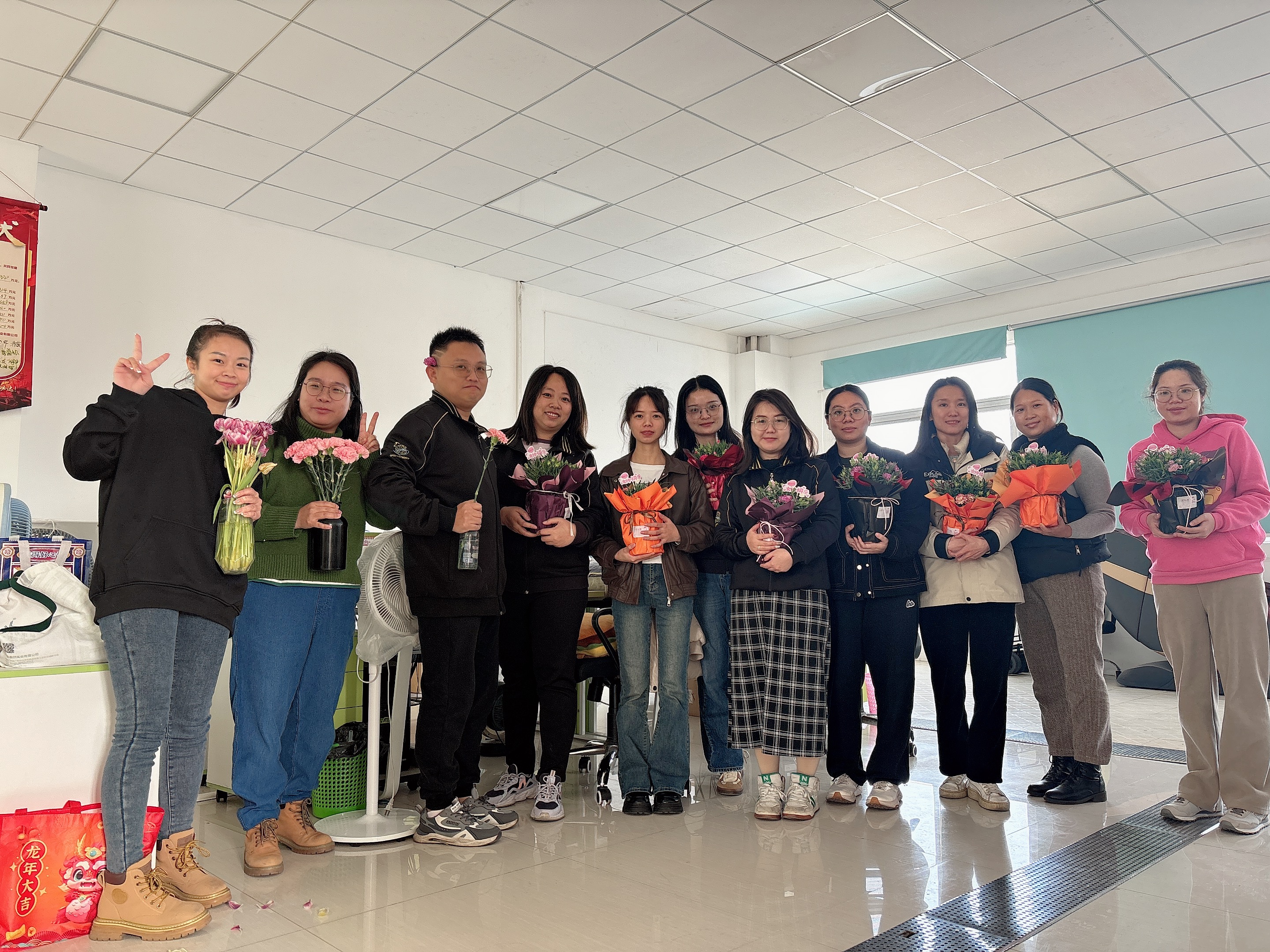 Smiling team members - horizontal