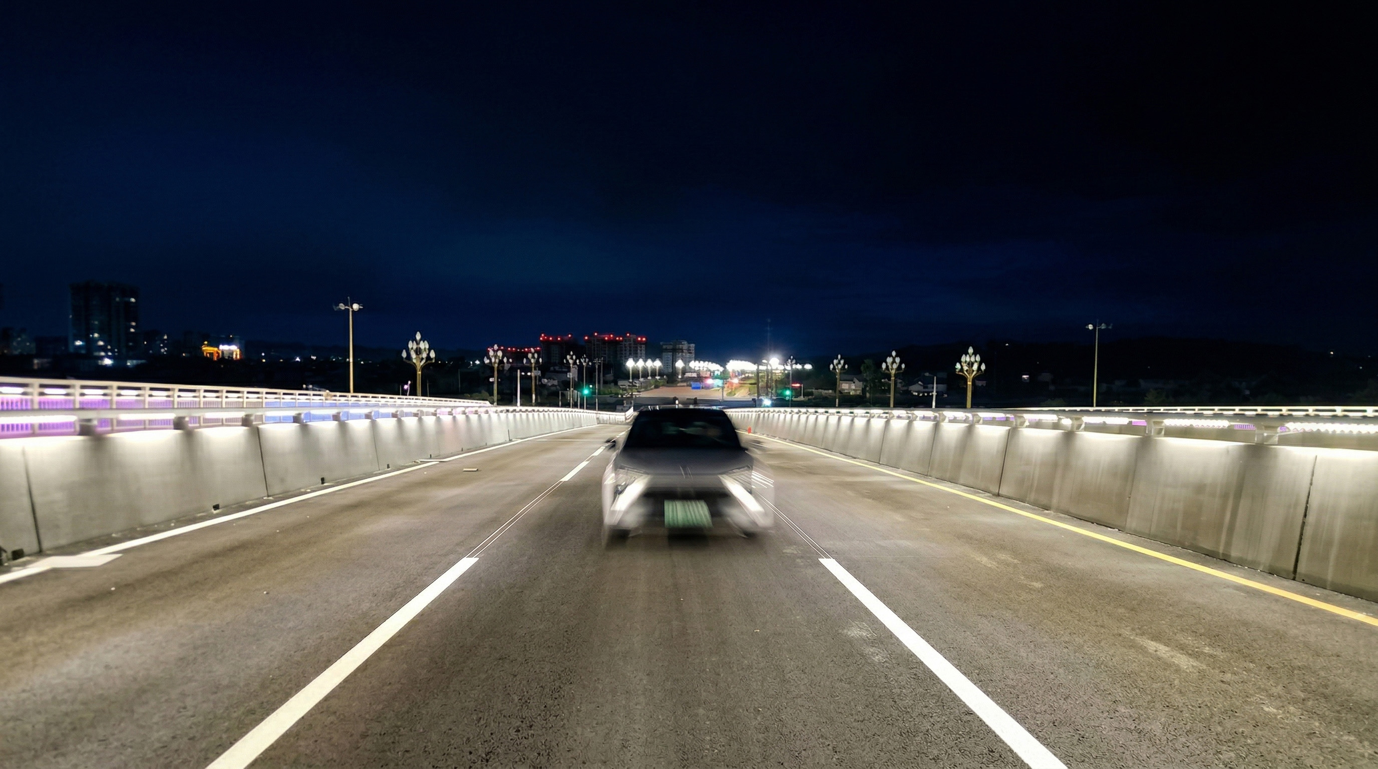 DMX512 controlled LED graze lighting accentuating bridge structural elements