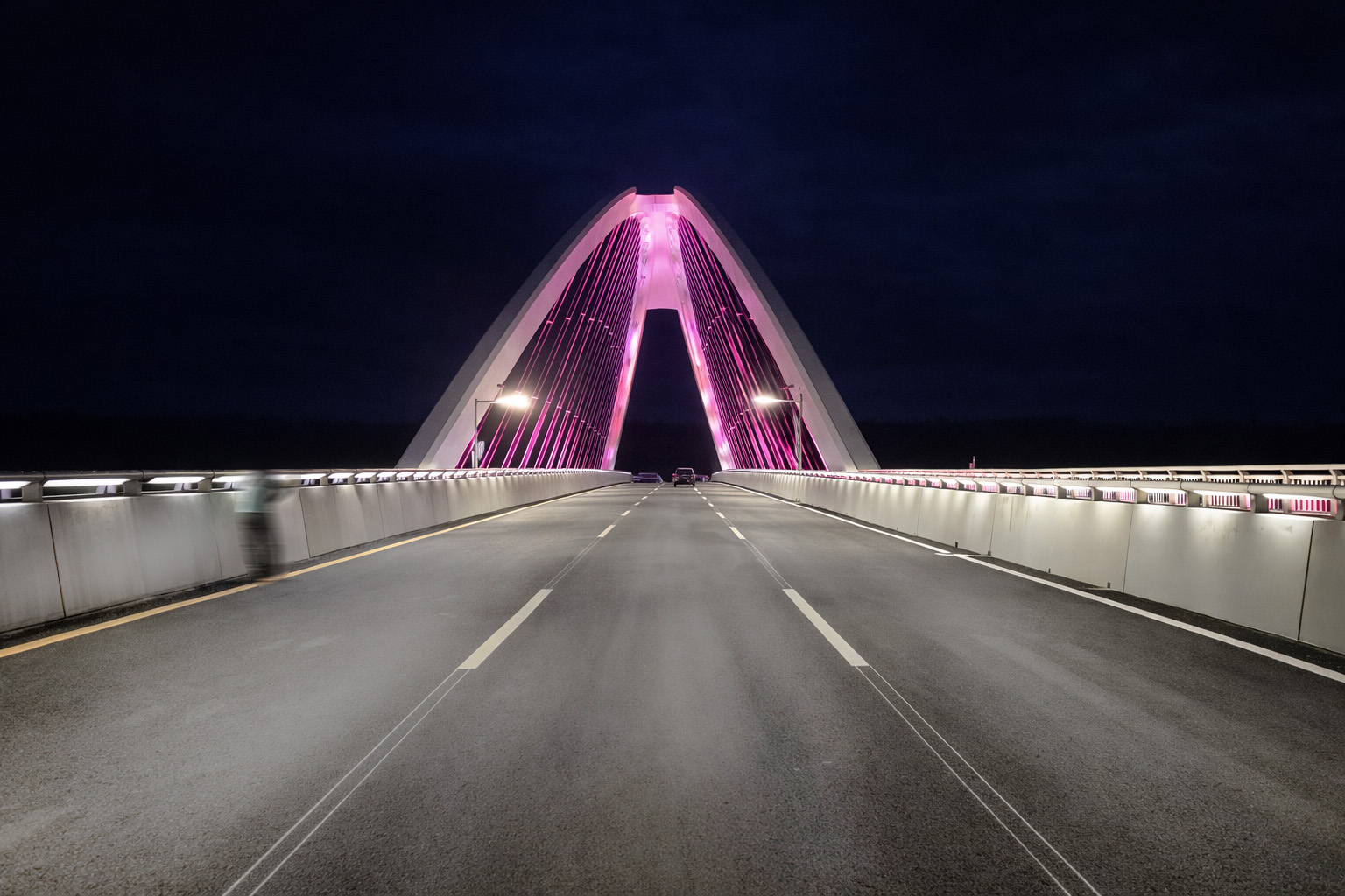 LWW-PZT-W38 LED lighting fixtures highlighting bridge suspension cables and concrete piers