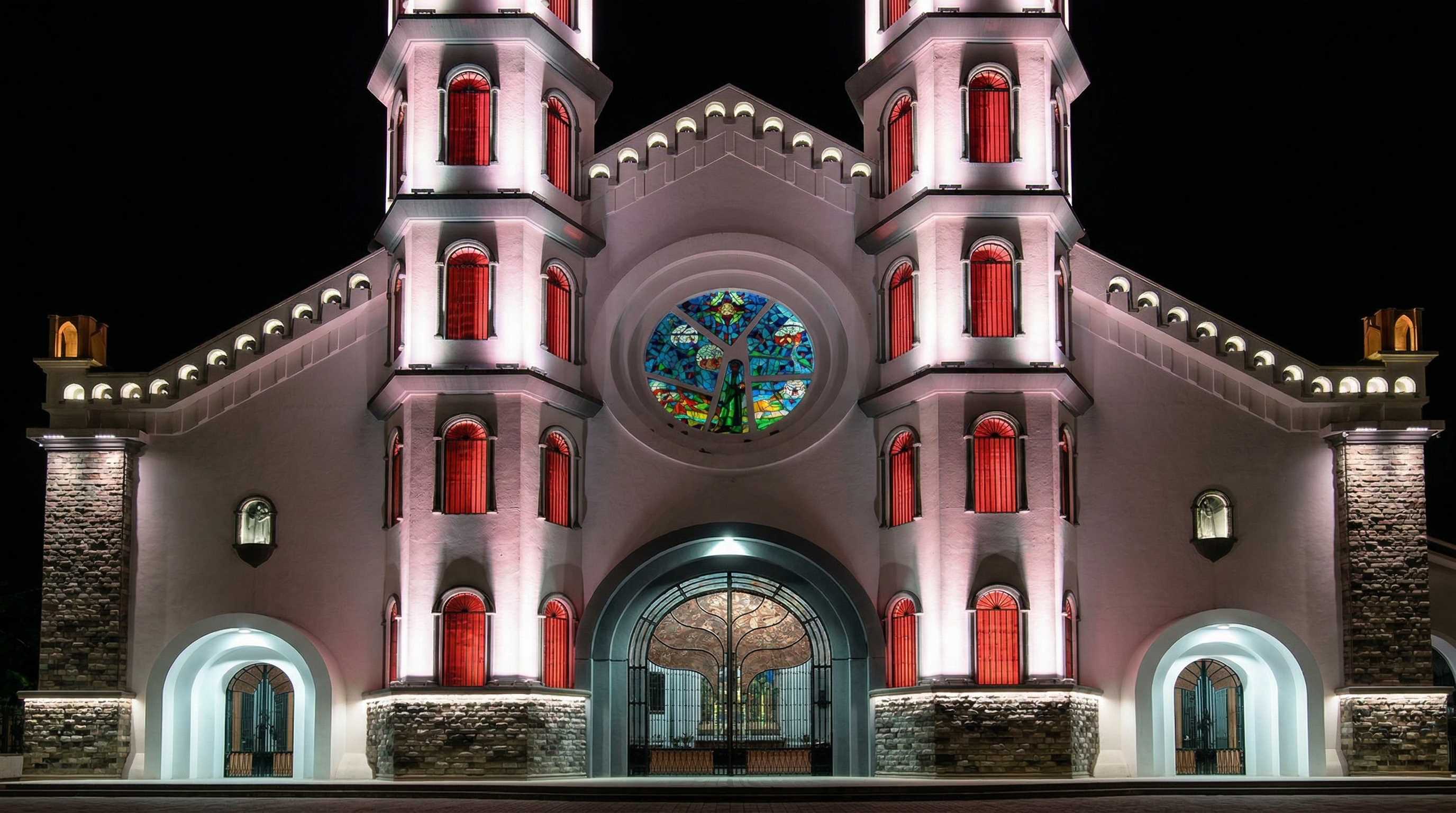 Vibrant LED illumination highlighting architectural details and domes