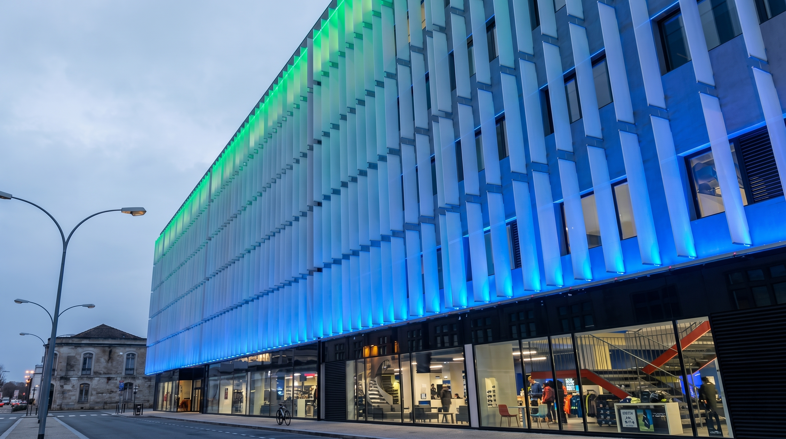 High-performance LED wall washers highlighting corporate building exterior