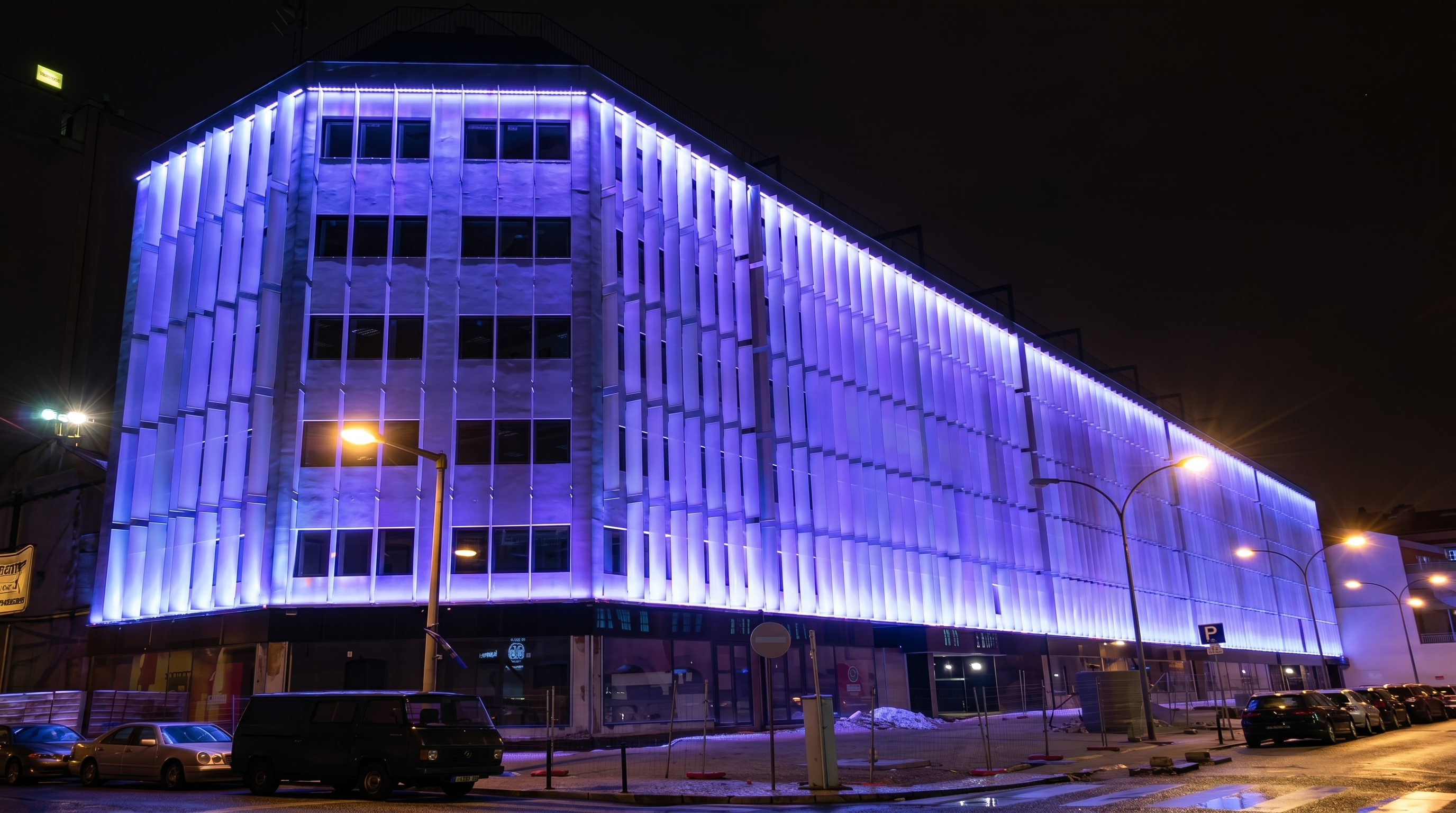 DMX512 controlled building illumination on modern vertical slat facade