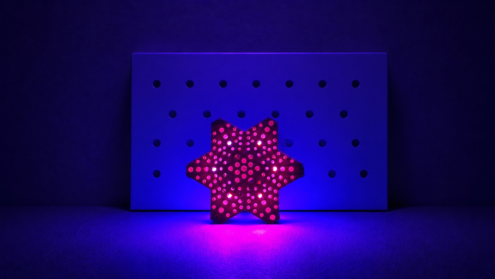 LPM-MJ-HEX130-DMX custom six-pointed star pixel fixture seated into the curtain wall node — TPK Lighting