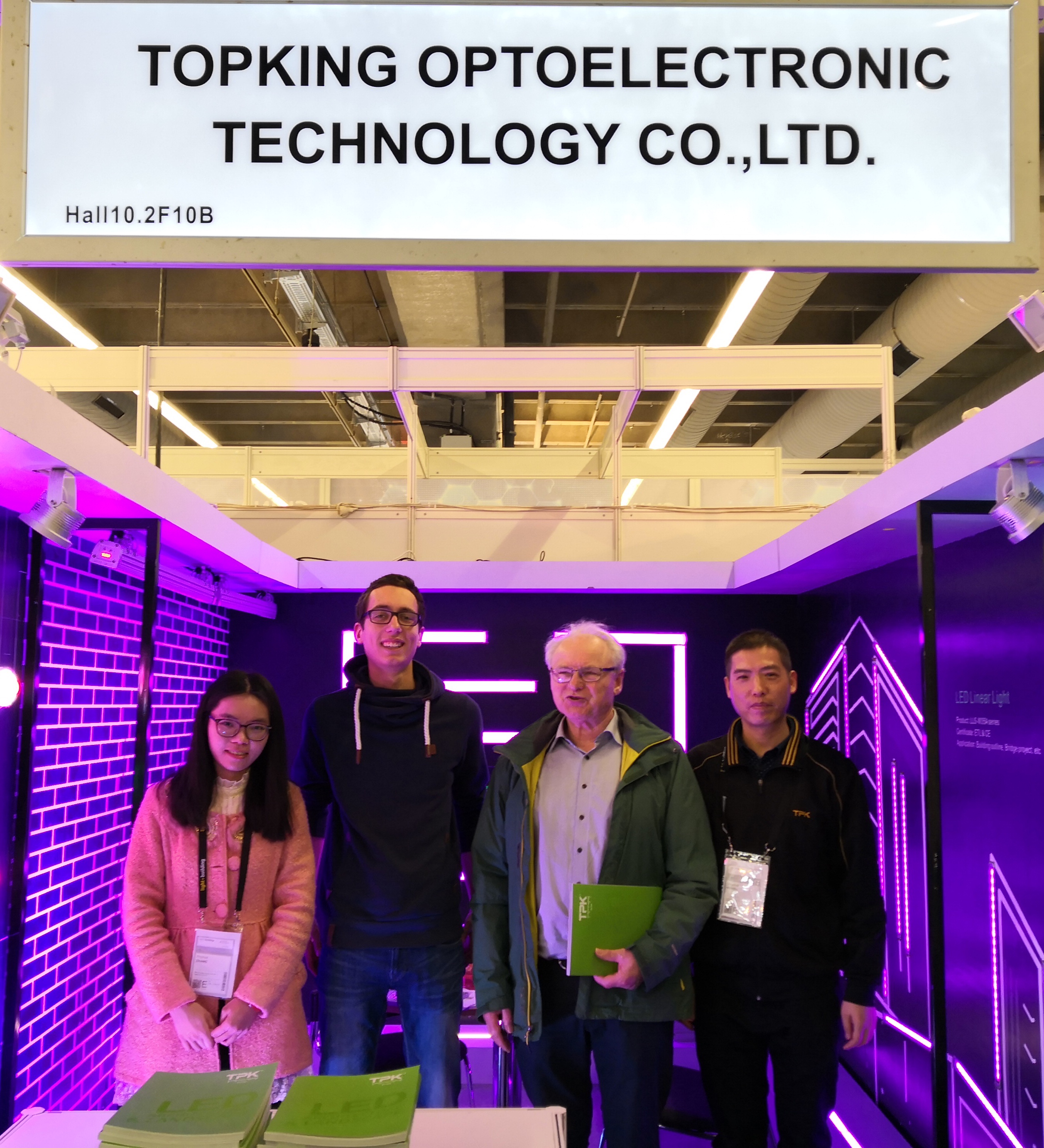 Global buyers interacting with TPK Lighting representatives at Frankfurt exhibition