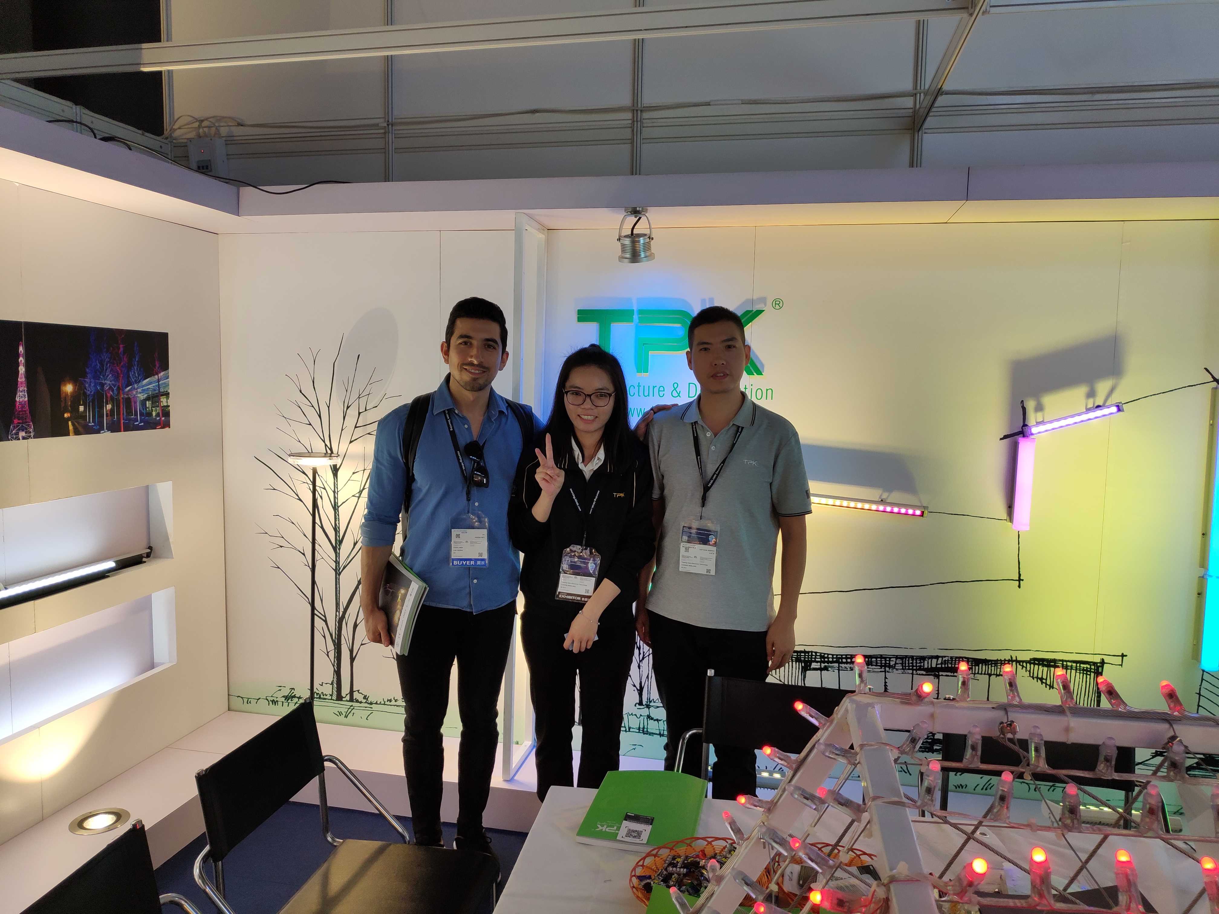 Networking and business negotiations at the TPK Lighting HKTDC exhibition booth