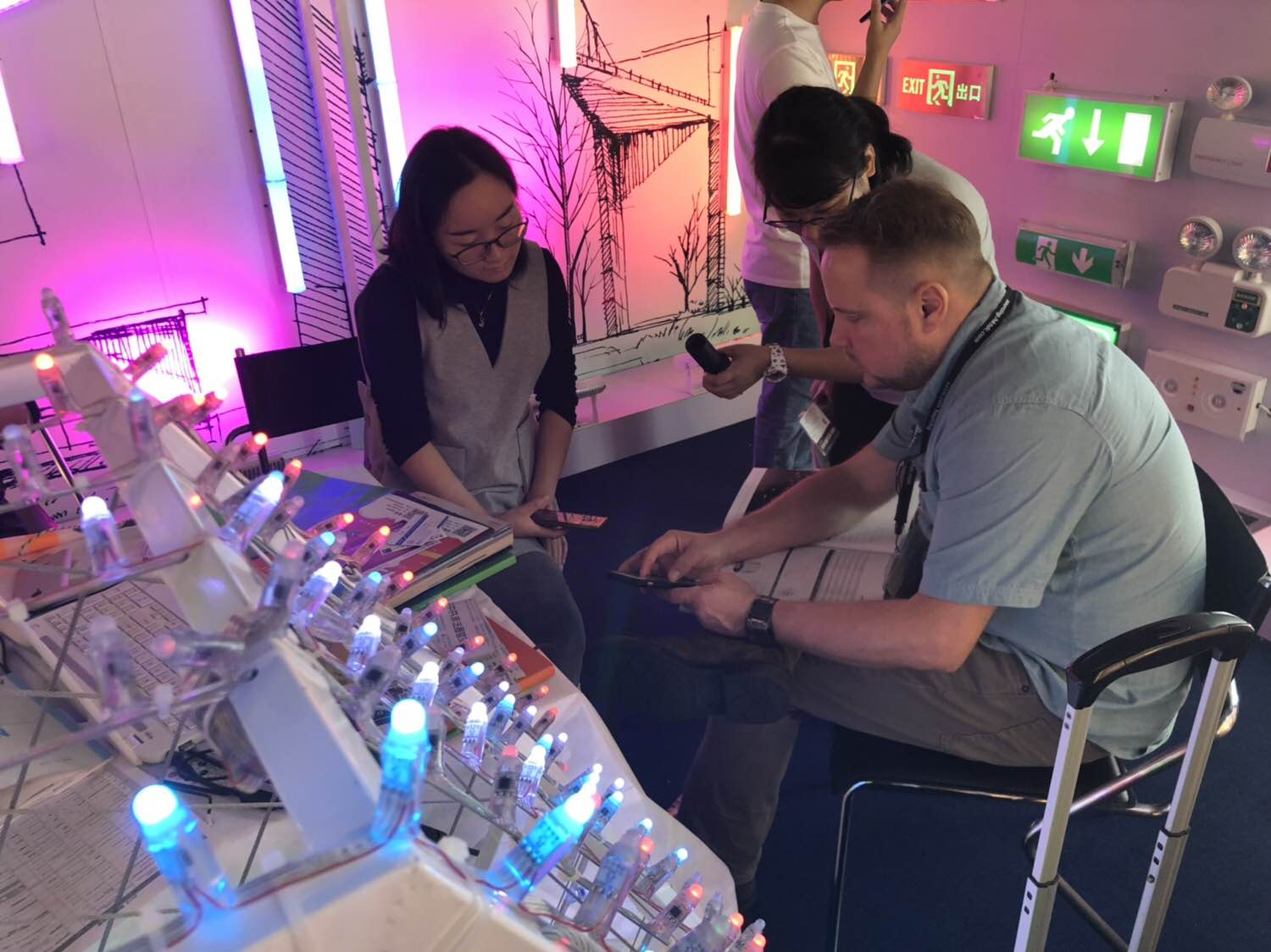 TPK Lighting sales team discussing large-scale facade lighting projects with global clients