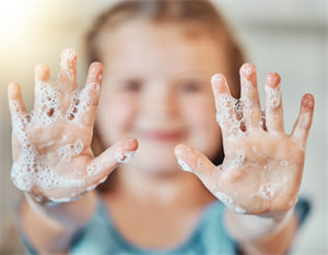 application picture showing a child playing with foam