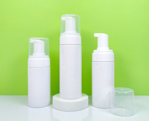 Set of 3 classic cylindrical PET foam pump bottles (100ml, 120ml, 150ml) with white bottles, white pumps, and clear overcaps. Perfect for foaming face wash and other foaming personal care products.