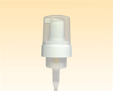 A white foaming soap pump with a clear overcap neck 43/410