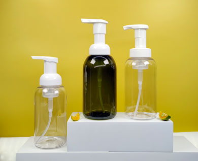 A collection of foaming soap bottles in neck size 40mm, featuring boston-round shoulders with white foam pumps.