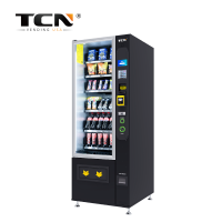Multi-mechanism vend system: spiral, conveyor belt, and pusher delivery
