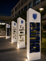 SZRODEN-SIGN-campus-pylon-sign-school-walkway-night-view