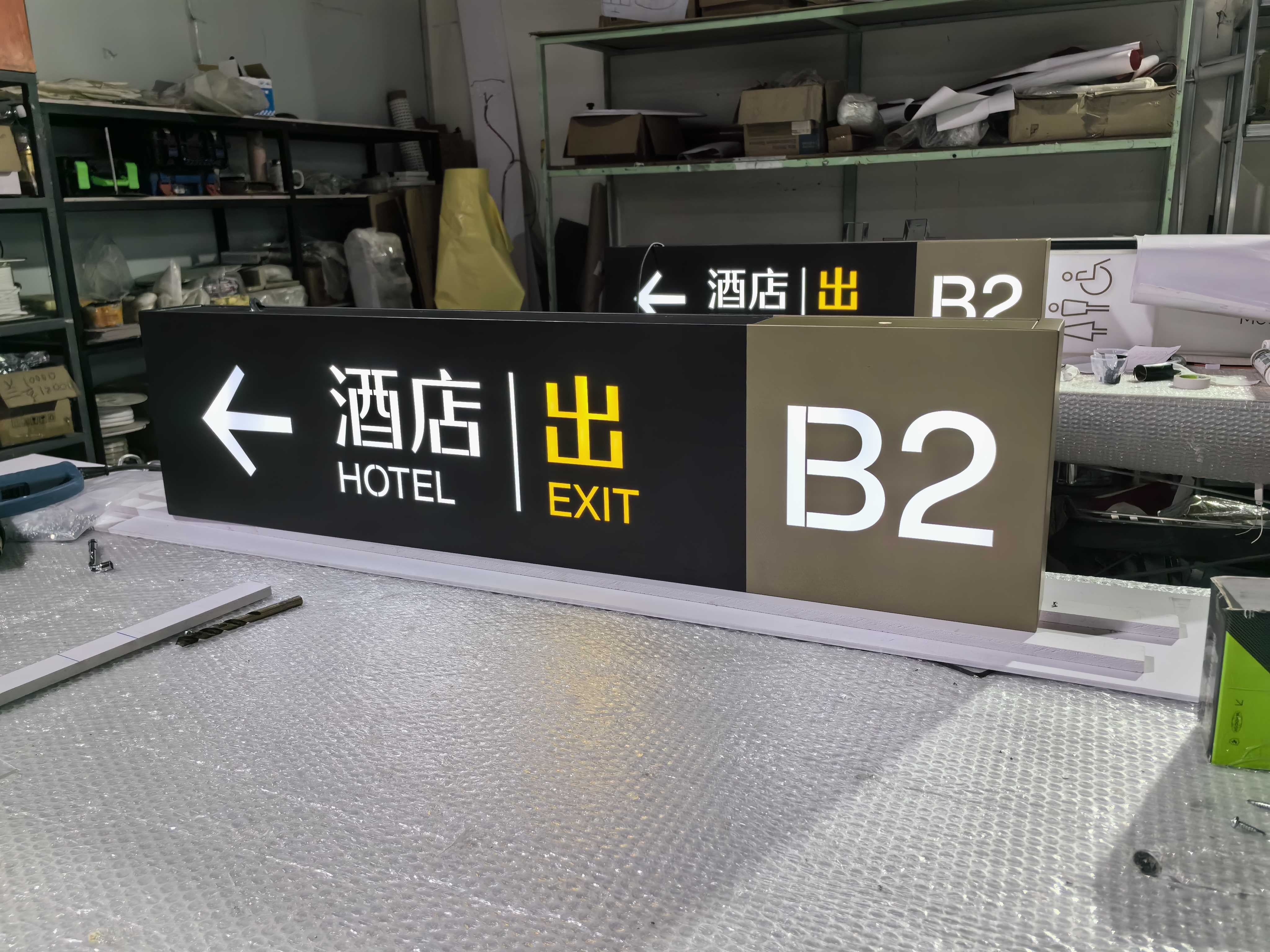 szroden-sign-custom-hanging-wayfinding-sign-factory-test