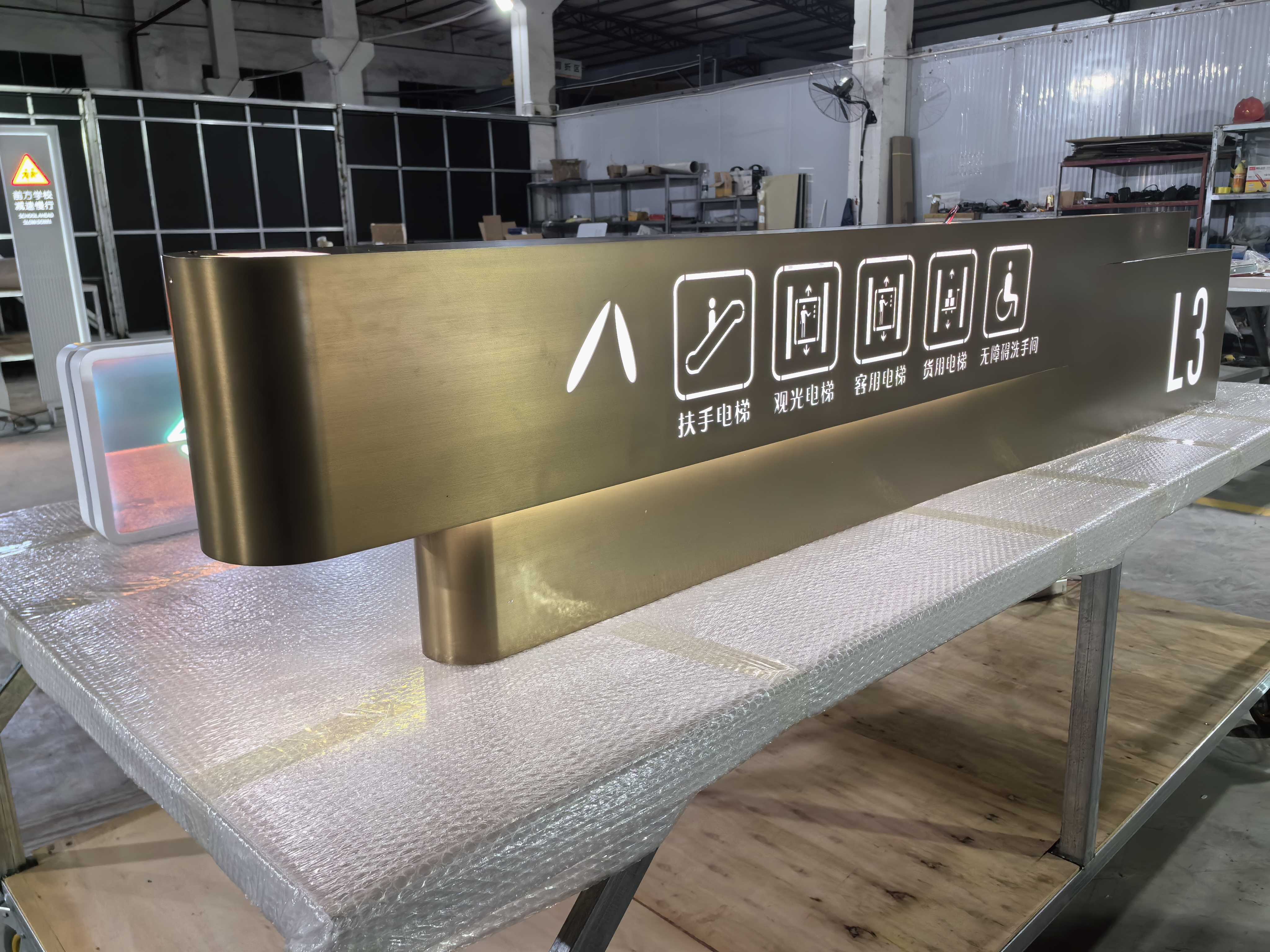 elevator-lobby-factory-interior-product-display-brushed-bronze