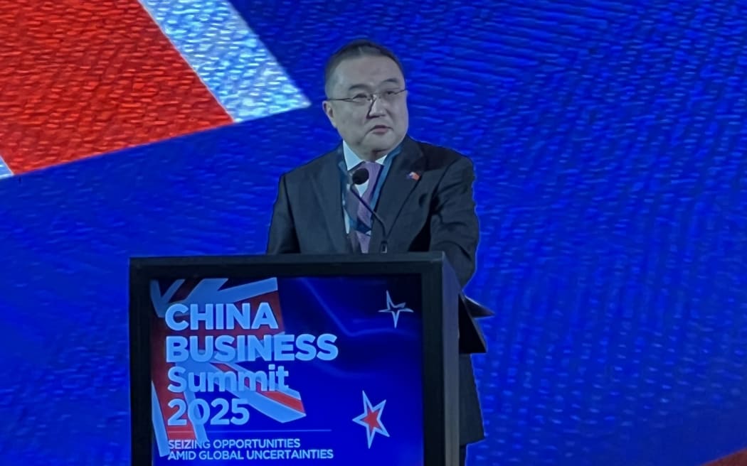 Chinese ambassador Wang Xiaolong speaking at the China Business Summit 2025.