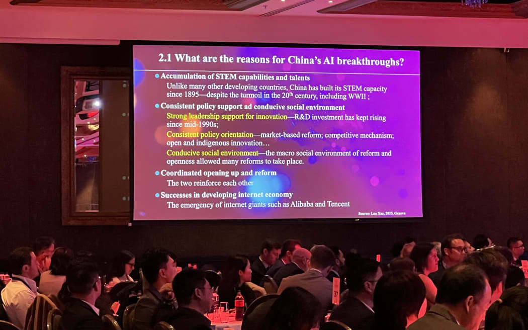 One of Zheng LIANG's slides, which shows the reasons for China's AI breakthroughs. China Business Summit 2025.