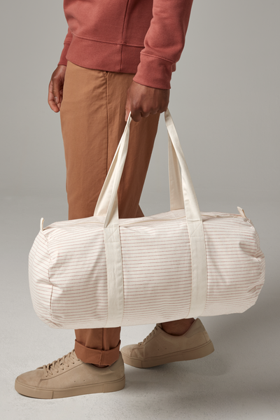 This bag gives you the appearance of a barrel. With the shape of a cylinder,  this medium to small size womens bag is a fashionable version of the bag.  With a small shoulder strap, zipper closure, and enough space to keep your necessities,  Barrel bag comes in many sizes and can carry a lot.