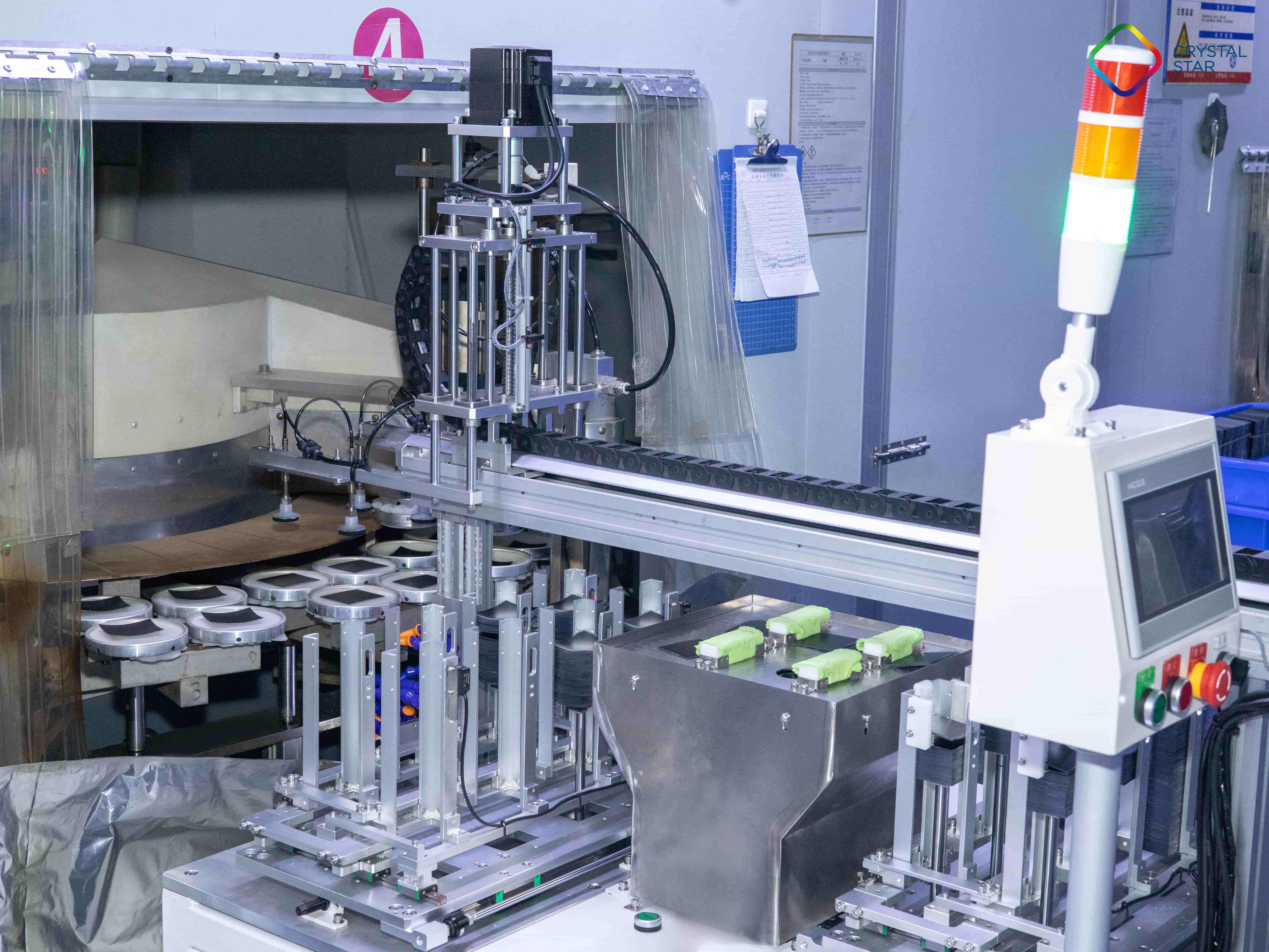 Advanced automated production equipment at ISO certified sun lenses manufacturer facility.