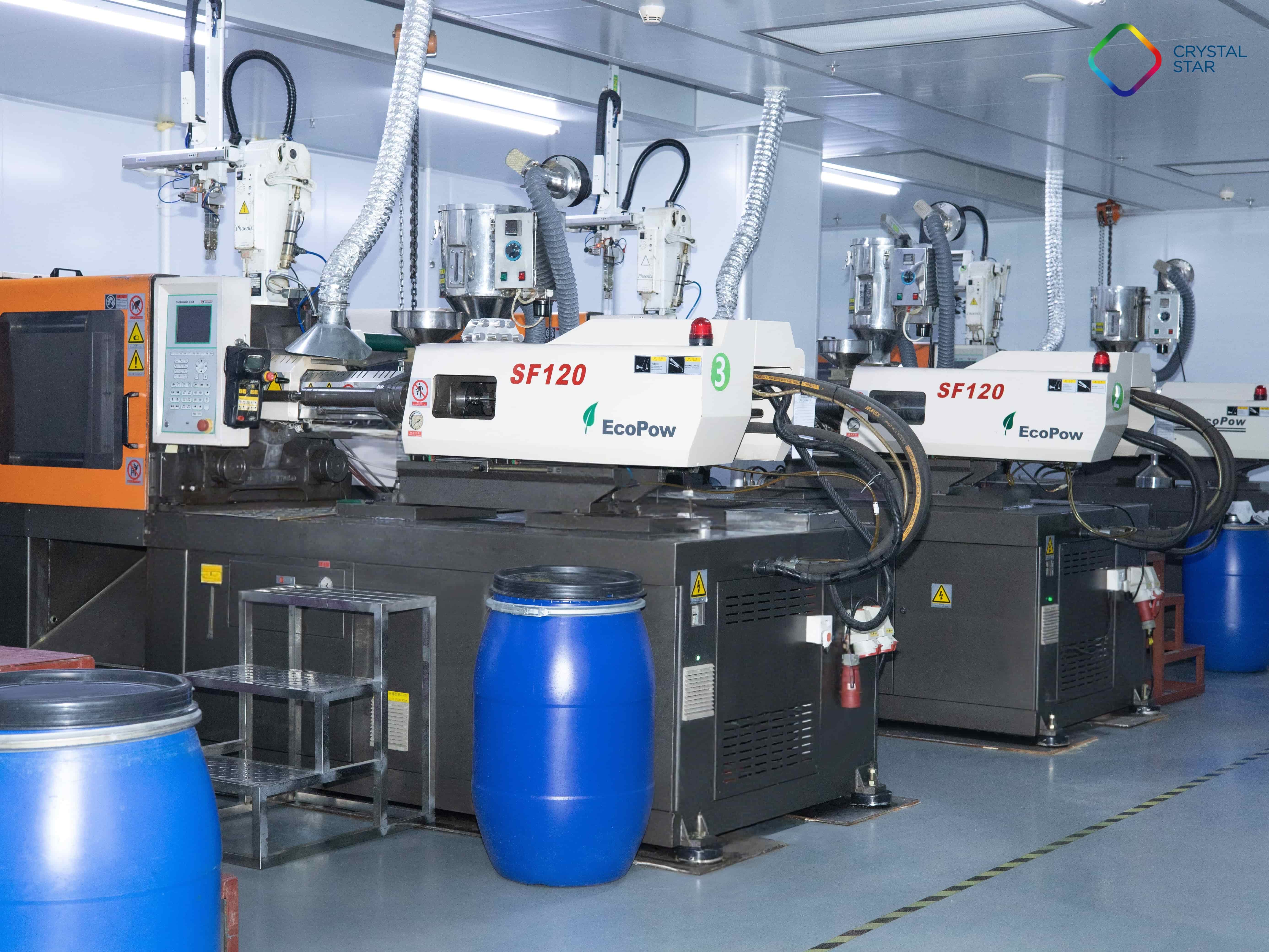 High-precision injection molding machines producing PC and Tritan injected sunglasses lens.